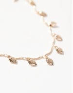 belly chain in strawberry charm detail in gold tone