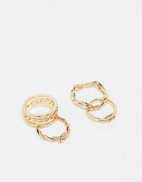 pack of 4 rings with knot design in gold tone