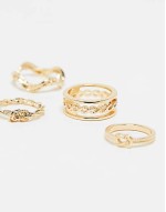 pack of 4 rings with knot design in gold tone